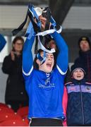 3 February 2024; Darragh McCarthy of Nenagh CBS lifts the Dr Harty Cup after the Dr Harty Cup final match between Nenagh CBS, of Nenagh and Ardscoil Ris, of Limerick at Cusack Park in Ennis. Photo by John Sheridan/Sportsfile