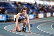 3 February 2024; Katie Doherty of Ratoath AC, Dublin, gets on her marks before competing in the Women's 200m during the AAI National Indoor League Final at the TUS Indoor Arena, Athlone in Westmeath. Photo by Ben McShane/Sportsfile