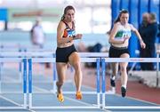 3 February 2024; Jessica Tappin of Clonliffe Harriers AC, Dublin, competes in the Women's 60m Hurdles during the AAI National Indoor League Final at the TUS Indoor Arena, Athlone in Westmeath. Photo by Ben McShane/Sportsfile