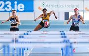 3 February 2024; Okwu Backari of Leevale AC, Cork, centre, competes in the Women's 60m Hurdles during the AAI National Indoor League Final at the TUS Indoor Arena, Athlone in Westmeath. Photo by Ben McShane/Sportsfile