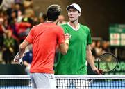 3 February 2024; Osgar Ó hOisín of Ireland, right, and Sebastian Ofner of Austria after their singles match on day one of the Davis Cup World Group I Play-off 1st Round match between Ireland and Austria at UL Sport Arena in Limerick. Photo by Brendan Moran/Sportsfile