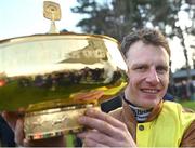 03 February 2024; Paul Townend with the cup after winning the Paddy Power Irish Gold Cup Chase on Galopin Des Champs during day one of the Dublin Racing Festival at Leopardstown Racecourse in Dublin. Photo by David Fitzgerald/Sportsfile
