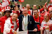 3 February 2024; Tennis Ireland president John Ryan with Austria supporers during day one of the Davis Cup World Group I Play-off 1st Round match between Ireland and Austria at UL Sport Arena in Limerick. Photo by Brendan Moran/Sportsfile