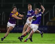 3 February 2024; Shaun Fitzpatrick of Laois in action against Seán Nolan of Wexford during the Allianz Football League Division 4 match between Wexford and Laois at Chadwicks Wexford Park in Wexford. Photo by Michael P Ryan/Sportsfile