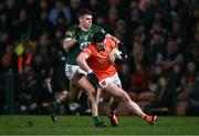 3 February 2024; Aidan Forker of Armagh is tackled by Eoghan Frayne of Meath during the Allianz Football League Division 2 match between Armagh and Meath at BOX-IT Athletic Grounds in Armagh. Photo by Ben McShane/Sportsfile