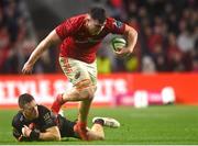 3 February 2024; Fineen Wycherley of Munster  breaks away from Dallas McLeod of Crusaders during the international rugby friendly match between Munster and Crusaders at SuperValu Páirc Uí Chaoimh in Cork. Photo by Sam Barnes/Sportsfile