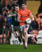 3 February 2024; Rory Grugan of Armagh in action against Adam O'Neill of Meath during the Allianz Football League Division 2 match between Armagh and Meath at BOX-IT Athletic Grounds in Armagh. Photo by Ben McShane/Sportsfile