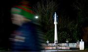 3 February 2024; A Mayo supporter passes a statue on their way to the Allianz Football League Division 1 match between Mayo and Dublin at Hastings Insurance MacHale Park in Castlebar, Mayo. Photo by Stephen McCarthy/Sportsfile