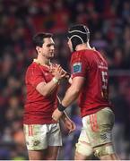 3 February 2024; Munster players Joey Carbery, left, and Fineen Wycherley celebrate their side's third try, scored by team-mate Scott Buckley, not pictured, during the international rugby friendly match between Munster and Crusaders at SuperValu Páirc Uí Chaoimh in Cork. Photo by Sam Barnes/Sportsfile