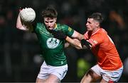 3 February 2024; Jack O'Connor of Meath in action against Greg McCabe of Armagh during the Allianz Football League Division 2 match between Armagh and Meath at BOX-IT Athletic Grounds in Armagh. Photo by Ben McShane/Sportsfile