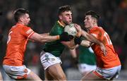 3 February 2024; Michael Flood of Meath in action against Greg McCabe, left, and Joe McElroy of Armagh during the Allianz Football League Division 2 match between Armagh and Meath at BOX-IT Athletic Grounds in Armagh. Photo by Ben McShane/Sportsfile