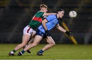 3 February 2024; Brian Fenton of Dublin in action against Jack Carney of Mayo during the Allianz Football League Division 1 match between Mayo and Dublin at Hastings Insurance MacHale Park in Castlebar, Mayo. Photo by Stephen McCarthy/Sportsfile