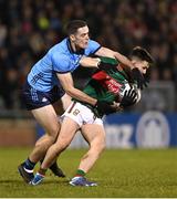 3 February 2024; Fergal Boland of Mayo is tackled by Brian Fenton of Dublin during the Allianz Football League Division 1 match between Mayo and Dublin at Hastings Insurance MacHale Park in Castlebar, Mayo. Photo by Stephen McCarthy/Sportsfile