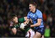 3 February 2024; Peadar O Cofaigh Byrne of Dublin in action against Sam Callinan of Mayo during the Allianz Football League Division 1 match between Mayo and Dublin at Hastings Insurance MacHale Park in Castlebar, Mayo. Photo by Stephen McCarthy/Sportsfile