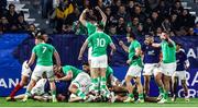 3 February 2024; Ireland players celebrate after teammate Brian Gleeson scored their side's second try during the U20 Six Nations Rugby Championship match between France and Ireland at Stade Maurice David in Aix-en-Provence, France. Photo by Johnny Fidelin/Sportsfile