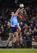 3 February 2024; Brian Fenton of Dublin in action against Jordan Flynn of Mayo during the Allianz Football League Division 1 match between Mayo and Dublin at Hastings Insurance MacHale Park in Castlebar, Mayo. Photo by Stephen McCarthy/Sportsfile