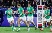 3 February 2024; Hugh Gavin of Ireland, second from left, celebrates with teammates after scoring their side's third try during the U20 Six Nations Rugby Championship match between France and Ireland at Stade Maurice David in Aix-en-Provence, France. Photo by Johnny Fidelin/Sportsfile