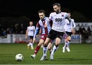 2 February 2024; Andy Boyle of Dundalk and Darragh Markey of Drogheda United during the PTSB Leinster Senior Cup / Malone Cup match between Dundalk and Drogheda United at Oriel Park in Dundalk, Louth. Photo by Ben McShane/Sportsfile