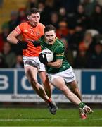 3 February 2024; Cathal Hickey of Meath and Paddy Burns of Armagh during the Allianz Football League Division 2 match between Armagh and Meath at BOX-IT Athletic Grounds in Armagh. Photo by Ben McShane/Sportsfile