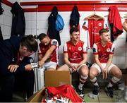 2 February 2024; Players, from left, Ruairi Keating, Ryan McLaughlin, Jay McClelland and Brandon Kavanagh wait their turn during a St Patrick's Athletic squad portraits session at Richmond Park in Dublin. Photo by Stephen McCarthy/Sportsfile
