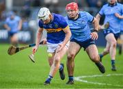 3 February 2024; Sean Ryan of Tipperary in action against Paddy Smyth of Dublin during the Allianz Hurling League Division 1 Group B match between Dublin and Tipperary at Parnell Park in Dublin. Photo by Tyler Miller/Sportsfile