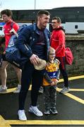4 February 2024; Six year old Luke O'Callaghan, from Shannon, with Patrick Horgan of Cork as the Cork players arrive for the Allianz Hurling League Division 1 Group A match between Clare and Cork at Cusack Park in Ennis, Clare. Photo by Ray McManus/Sportsfile