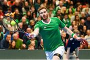 4 February 2024; David O'Hare of Ireland in action against Alexander Erler and Lucas Miedler of Austria during his doubles match on day two of the Davis Cup World Group I Play-off 1st Round match between Ireland and Austria at UL Sport Arena in Limerick. Photo by Brendan Moran/Sportsfile