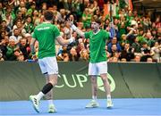4 February 2024; Conor Gannon, right, and David O'Hare of Ireland celebrate winning a point against Alexander Erler and Lucas Miedler of Austria during their doubles match on day two of the Davis Cup World Group I Play-off 1st Round match between Ireland and Austria at UL Sport Arena in Limerick. Photo by Brendan Moran/Sportsfile