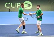 4 February 2024; David O'Hare, left, and Conor Gannon of Ireland celebrate winning a point against Alexander Erler and Lucas Miedler of Austria during their doubles match on day two of the Davis Cup World Group I Play-off 1st Round match between Ireland and Austria at UL Sport Arena in Limerick. Photo by Brendan Moran/Sportsfile