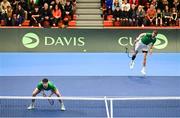 4 February 2024; David O'Hare, right, and Conor Gannon of Ireland in action against Alexander Erler and Lucas Miedler of Austria during their doubles match on day two of the Davis Cup World Group I Play-off 1st Round match between Ireland and Austria at UL Sport Arena in Limerick. Photo by Brendan Moran/Sportsfile