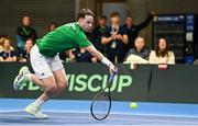 4 February 2024; Conor Gannon of Ireland in action against Alexander Erler and Lucas Miedler of Austria during his doubles match on day two of the Davis Cup World Group I Play-off 1st Round match between Ireland and Austria at UL Sport Arena in Limerick. Photo by Brendan Moran/Sportsfile