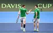 4 February 2024; David O'Hare, left, and Conor Gannon of Ireland celebrates winning a point during their doubles match against Alexander Erler and Lucas Miedler of Austria on day two of the Davis Cup World Group I Play-off 1st Round match between Ireland and Austria at UL Sport Arena in Limerick. Photo by Brendan Moran/Sportsfile