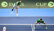 4 February 2024; David O'Hare, left, and Conor Gannon of Ireland in action against Alexander Erler and Lucas Miedler of Austria during their doubles match on day two of the Davis Cup World Group I Play-off 1st Round match between Ireland and Austria at UL Sport Arena in Limerick. Photo by Brendan Moran/Sportsfile