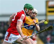 4 February 2024; Robbie O Flynn of Cork is tackled by Adam Hogan of Clare during the Allianz Hurling League Division 1 Group A match between Clare and Cork at Cusack Park in Ennis, Clare. Photo by Ray McManus/Sportsfile