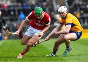4 February 2024; Robbie O Flynn of Cork is tackled by Adam Hogan of Clare during the Allianz Hurling League Division 1 Group A match between Clare and Cork at Cusack Park in Ennis, Clare. Photo by Ray McManus/Sportsfile