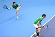 4 February 2024; Conor Gannon, right, and David O'Hare of Ireland in action against Alexander Erler and Lucas Miedler of Austria during their doubles match on day two of the Davis Cup World Group I Play-off 1st Round match between Ireland and Austria at UL Sport Arena in Limerick. Photo by Brendan Moran/Sportsfile