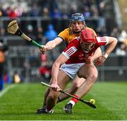4 February 2024; Brian Hayes of Cork is tackled by David McInerney of Clare during the Allianz Hurling League Division 1 Group A match between Clare and Cork at Cusack Park in Ennis, Clare. Photo by Ray McManus/Sportsfile