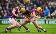 4 February 2024; Billy Ryan of Kilkenny in action against Conor Foley, left, and Damien Reck of Wexford during the Allianz Hurling League Division 1 Group A match between Kilkenny and Wexford at UPMC Nowlan Park in Kilkenny. Photo by Piaras Ó Mídheach/Sportsfile