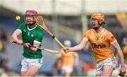 4 February 2024; Shane O'Brien of Limerick in action against Niall O'Connor of Antrim during the Allianz Hurling League Division 1 Group B match between Limerick and Antrim at FBD Semple Stadium in Thurles, Tipperary. Photo by Tom Beary/Sportsfile