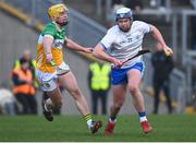 4 February 2024; Stephen Bennett of Waterford in action against Killian Sampson of Offaly during the Allianz Hurling League Division 1 Group A match between Offaly and Waterford at Glenisk O'Connor Park in Tullamore, Offaly. Photo by Tyler Miller/Sportsfile
