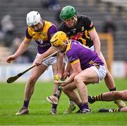 4 February 2024; Eoin Cody of Kilkenny in action against Wexford players Niall Murphy, left, and Damien Reck during the Allianz Hurling League Division 1 Group A match between Kilkenny and Wexford at UPMC Nowlan Park in Kilkenny. Photo by Piaras Ó Mídheach/Sportsfile