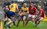 4 February 2024; Cathal Malone of Clare catches the sliotar, over the line, as Robin Mounsey of Clare, Brian Hayes and Sean Twomey of Cork look on during the Allianz Hurling League Division 1 Group A match between Clare and Cork at Cusack Park in Ennis, Clare. Photo by Ray McManus/Sportsfile