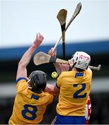4 February 2024; The sliotar drops between Clare players Cathal Malone, 8, Adam Hogan and Robbie O Flynn of Cork during the Allianz Hurling League Division 1 Group A match between Clare and Cork at Cusack Park in Ennis, Clare. Photo by Ray McManus/Sportsfile