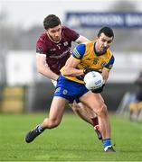 4 February 2024; Ciarán Lennon of Roscommon in action against Eoghan Kelly of Galway during the Allianz Football League Division 1 match between Roscommon and Galway at Dr Hyde Park in Roscommon. Photo by Daire Brennan/Sportsfile