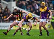 4 February 2024; Damien Reck of Wexford, supported by team-mate Conor Hearne, right, in action against Cian Kenny of Kilkenny during the Allianz Hurling League Division 1 Group A match between Kilkenny and Wexford at UPMC Nowlan Park in Kilkenny. Photo by Piaras Ó Mídheach/Sportsfile