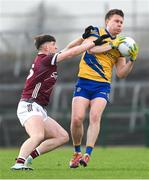 4 February 2024; Niall Daly of Roscommon in action against Cillian Ó Curraoin of Galway during the Allianz Football League Division 1 match between Roscommon and Galway at Dr Hyde Park in Roscommon. Photo by Daire Brennan/Sportsfile