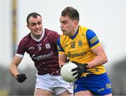 4 February 2024; Enda Smith of Roscommon in action against John Maher of Galway during the Allianz Football League Division 1 match between Roscommon and Galway at Dr Hyde Park in Roscommon. Photo by Daire Brennan/Sportsfile