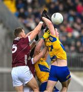 4 February 2024; Senan Lambe of Roscommon in action against Dylan McHugh of Galway during the Allianz Football League Division 1 match between Roscommon and Galway at Dr Hyde Park in Roscommon. Photo by Daire Brennan/Sportsfile