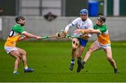 4 February 2024; Kieran Bennett of Waterford in action against David Nally, left, and Cathal King of Offaly during the Allianz Hurling League Division 1 Group A match between Offaly and Waterford at Glenisk O'Connor Park in Tullamore, Offaly. Photo by Tyler Miller/Sportsfile