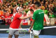 4 February 2024; Lucas Miedler of Austria, left, and Michael Agwi of Ireland after their singles match on day two of the Davis Cup World Group I Play-off 1st Round match between Ireland and Austria at UL Sport Arena in Limerick. Photo by Brendan Moran/Sportsfile